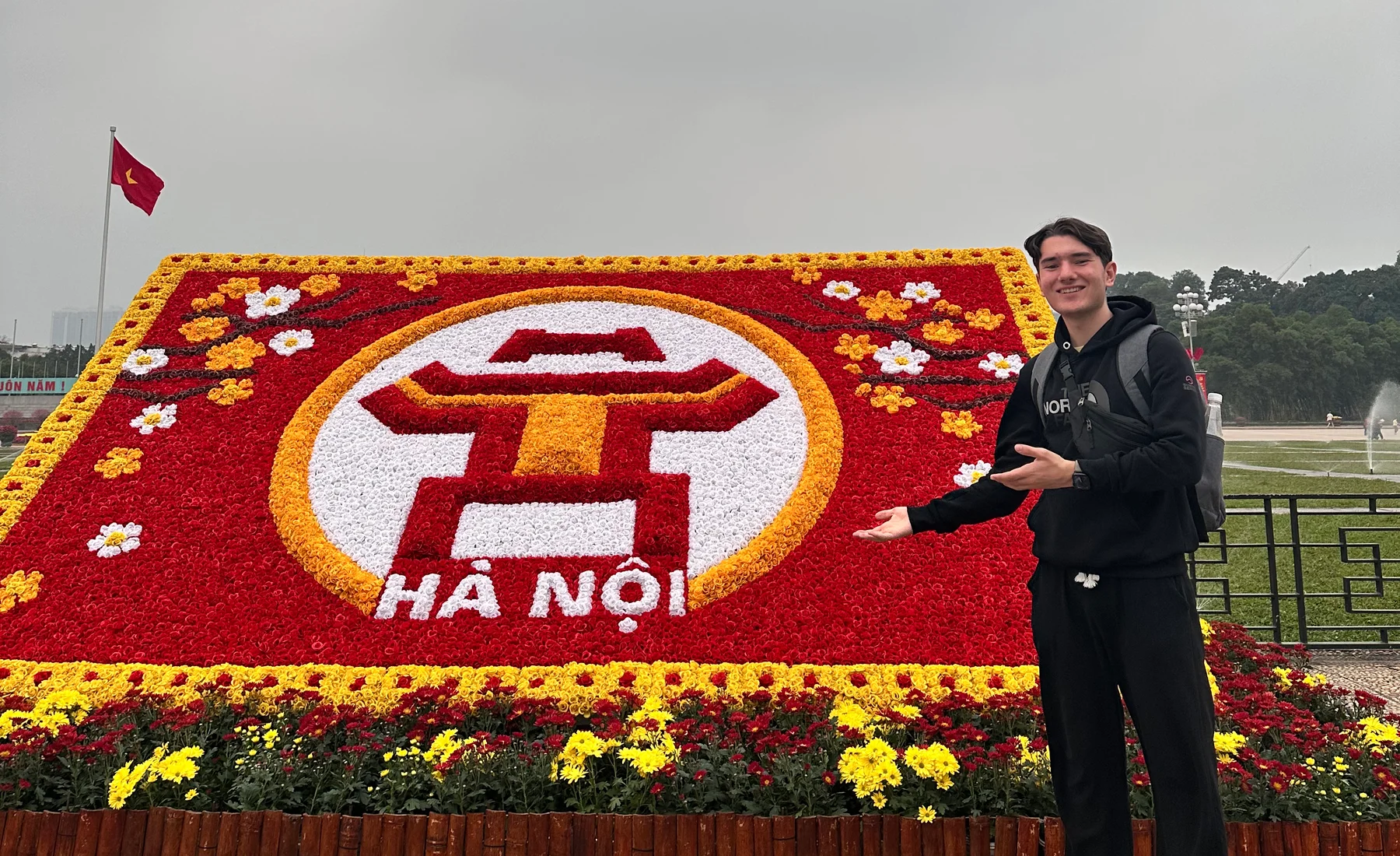 Hà Nội — beside the city's floral emblem in Ba Đình